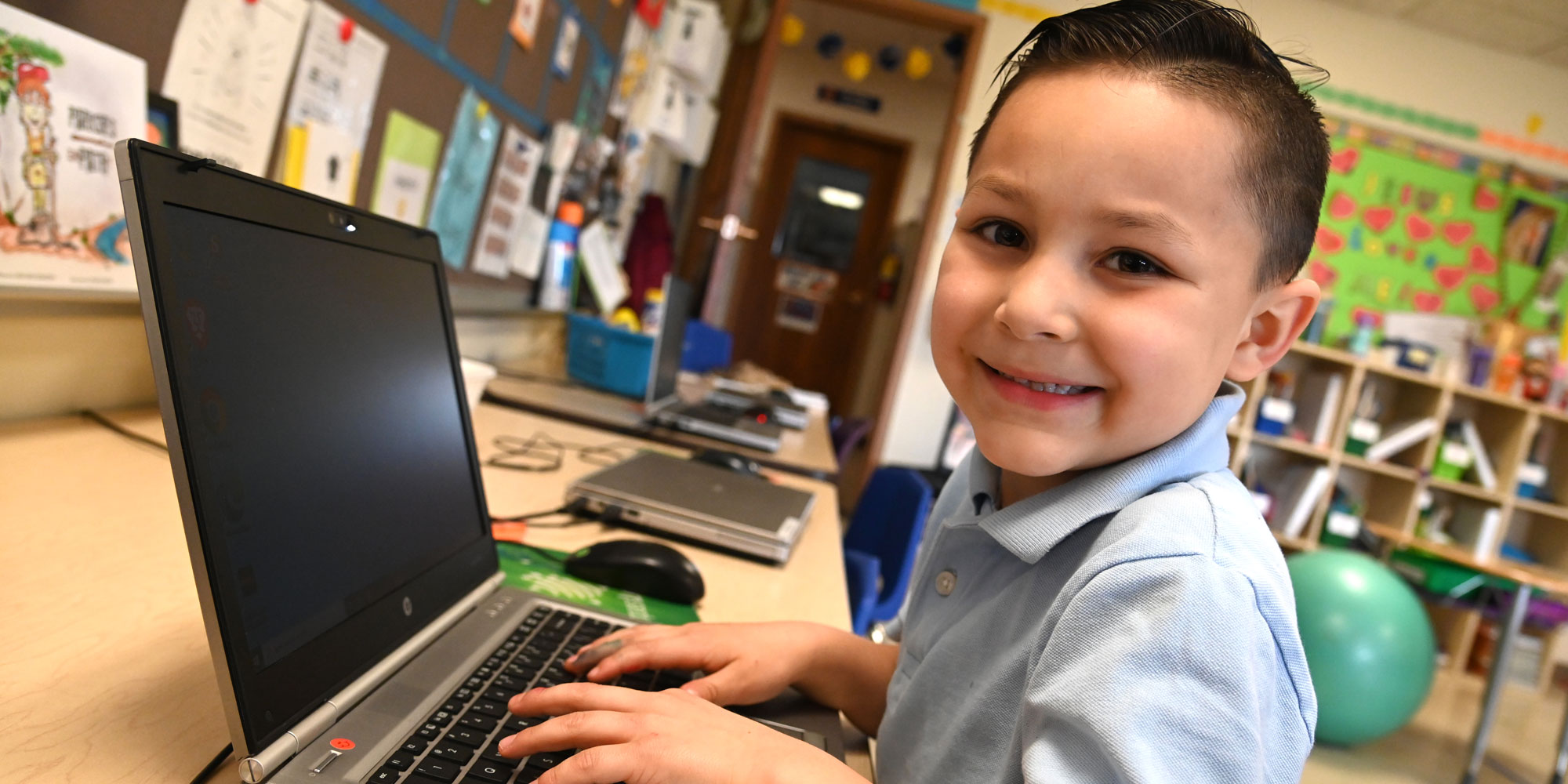 Student uses laptop.