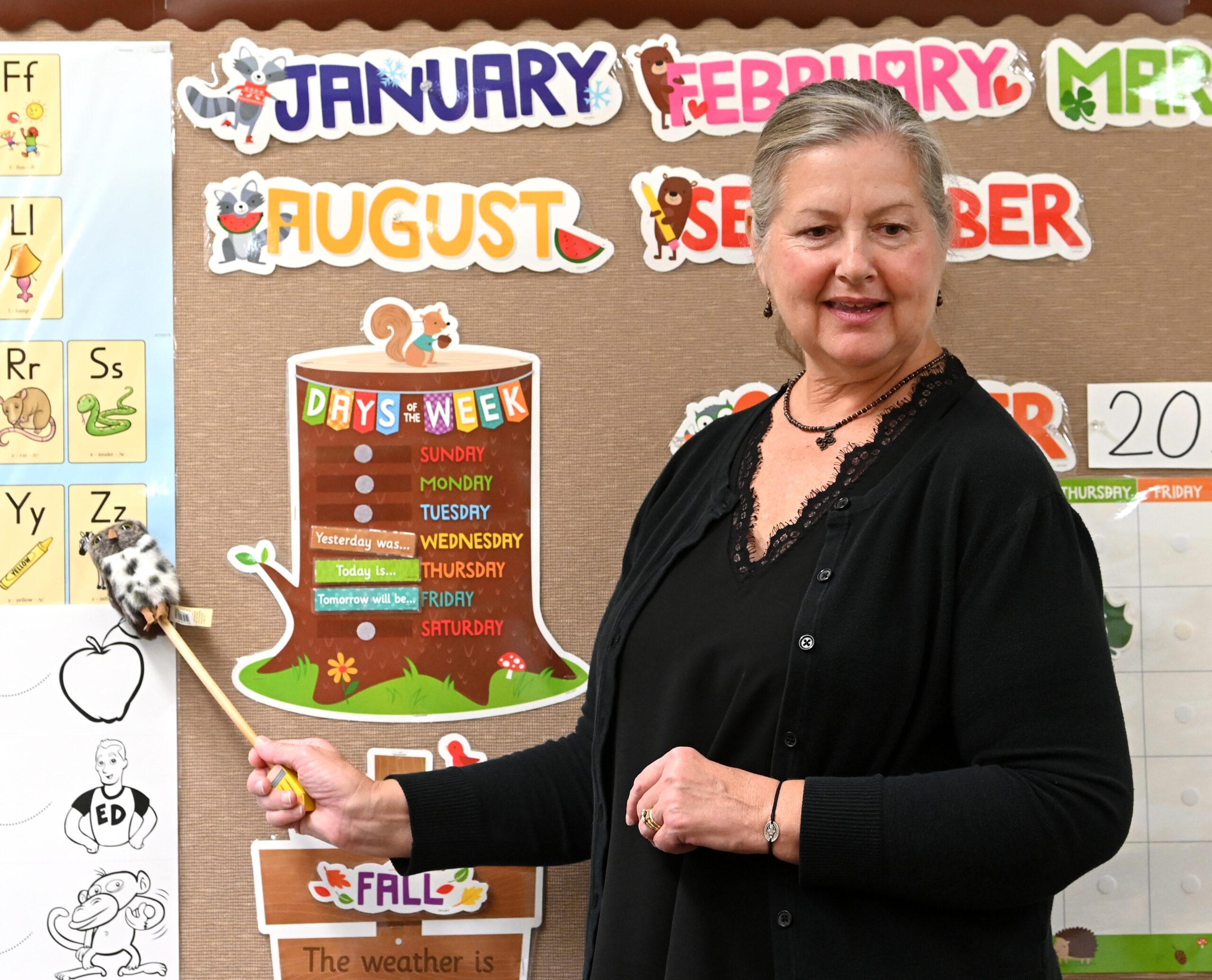 Teacher practices alphabet at Holy Cross School which is located near Wequiock Falls.