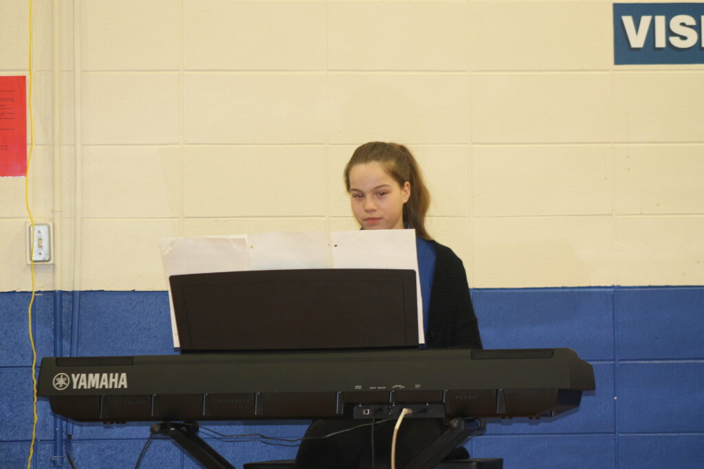 Julia VanEgeren, 7th grade playing Chasing Cars on the piano