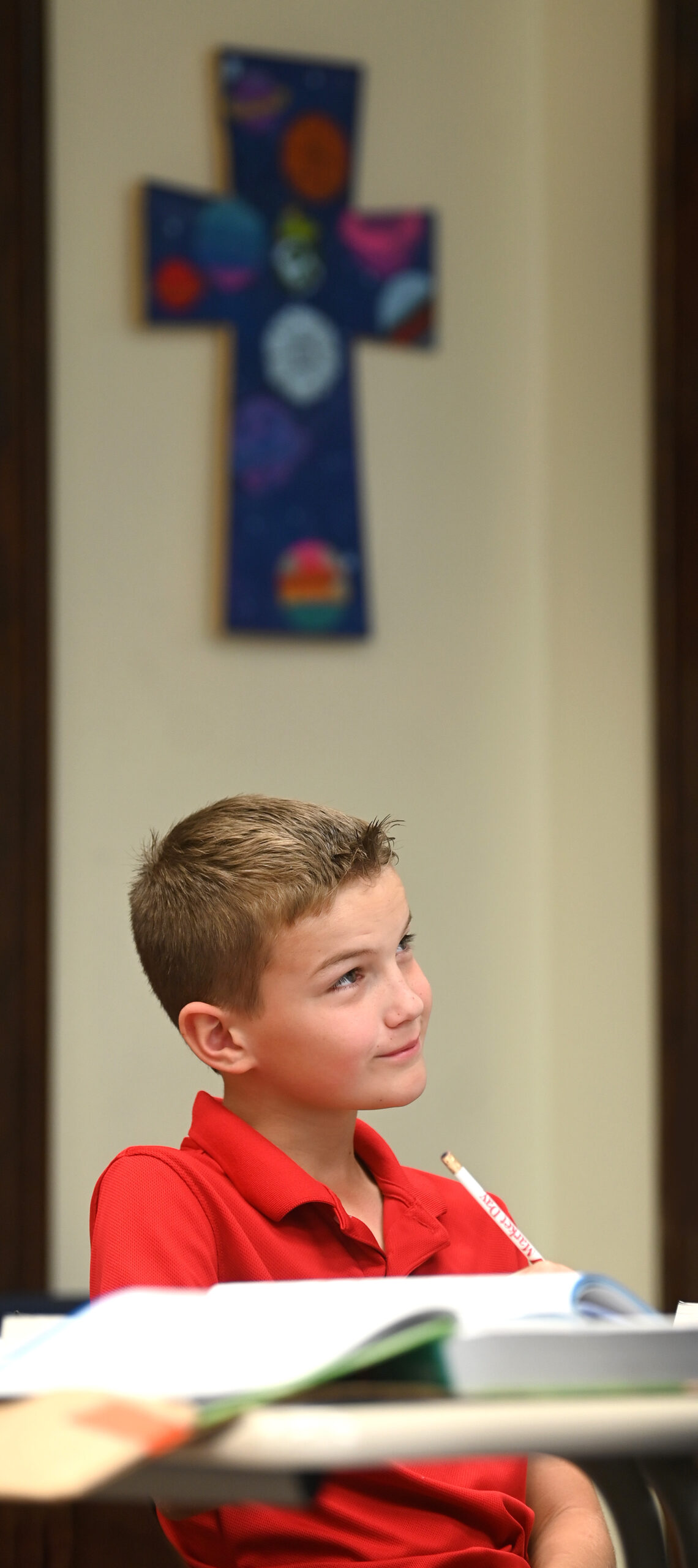student with book listening